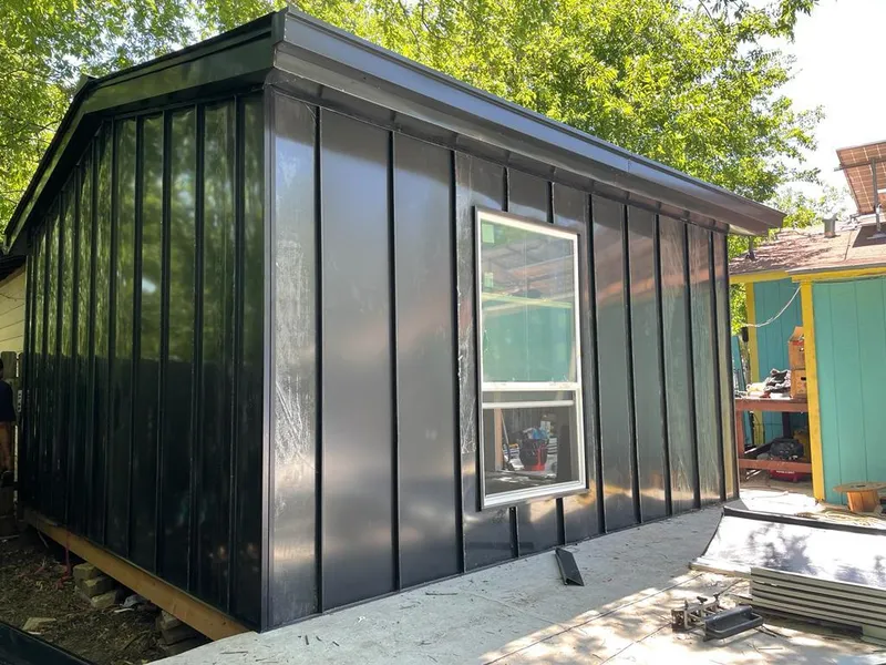 Black standing seam metal wall panels for Roof Inspection in Lumberton