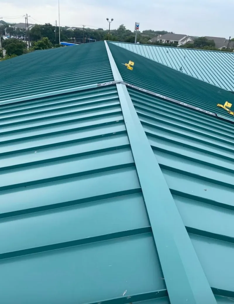 Green commercial metal roof ridge and valley for Metal Roof Repair in Lumberton